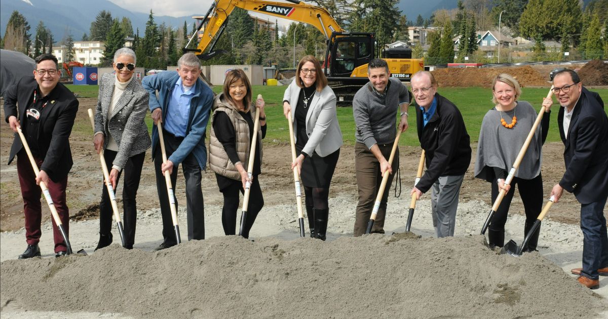ground breaking with shovels