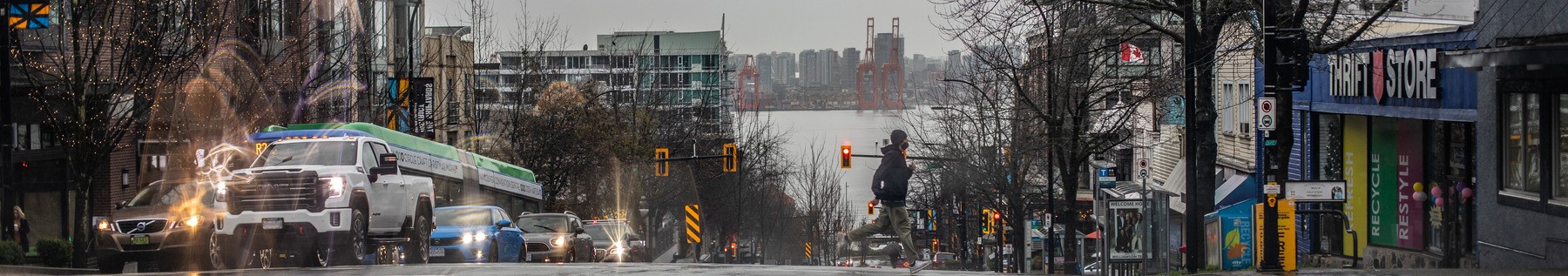 3rd and Lonsdale intersection on rainy day.