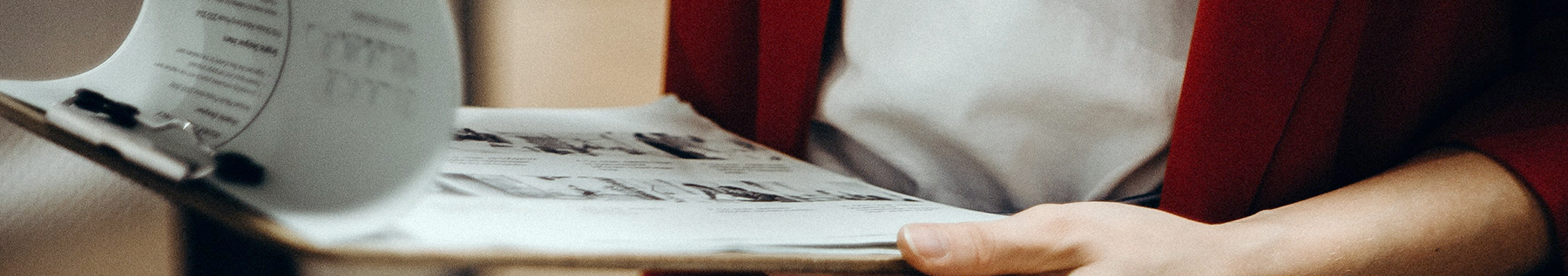 person holding clipboard