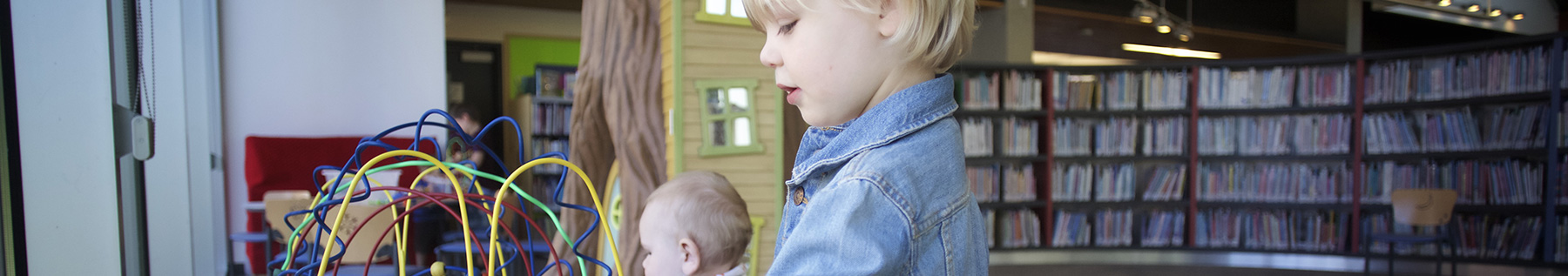 children playing at library