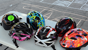 pile of bike helmets
