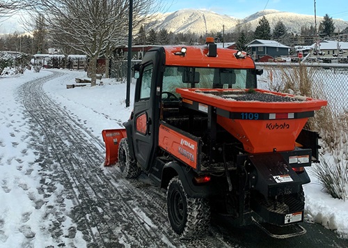 machine clearing City paths of snow