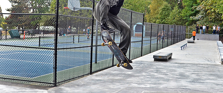 Mahon Park skateboarder and pickleball court