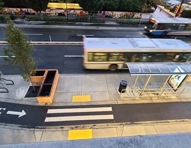Picture of esplanade with bus driving by bike lane
